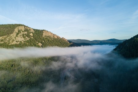 Sunset in the Ural mountains in Karatash ridge. Flying by droneの写真素材