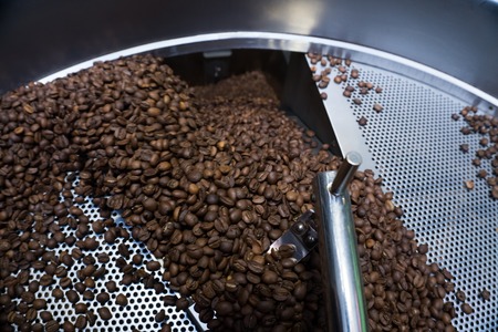 Mixing roasted coffeeの写真素材