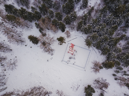 cellular tower in the winter forest in the mountainsの写真素材