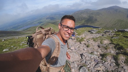 The man on the top of Carrauntoohil makes a selfie