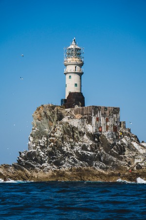 Fastnet lighthouse. A view from the boatの写真素材