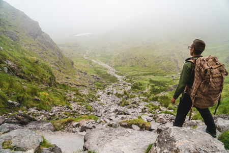 The man on the trail to Carrauntoohil. On the devils ladderの写真素材