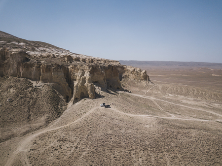 Car parking in deserts and mountains in Kazakhstan like from another planetの写真素材