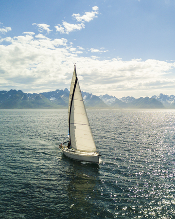 Sailing yacht in the sea. Aerial view by droneの写真素材
