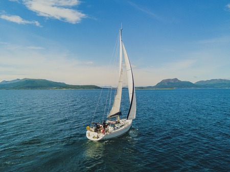 Sailing yacht in the sea. Aerial view by droneの写真素材