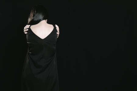 Asian woman in emotional distress experiencing depression, loneliness, tiredness, weakness, sadness