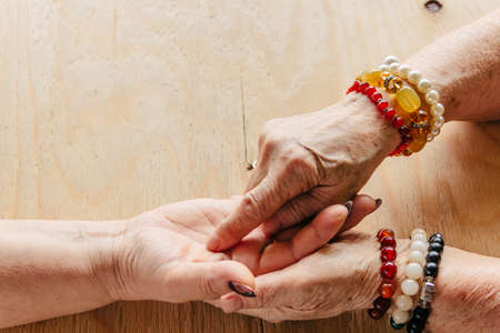 Grandma magic, fortune telling, palmistry. Chiromancy, women hands, destiny readingの写真素材