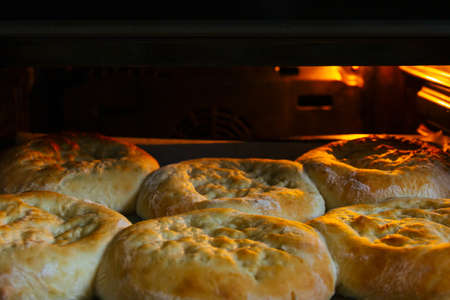 Cooking at home, bread is baking the oven