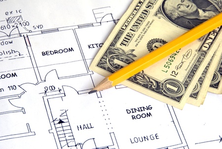 money on building plans and pencil
