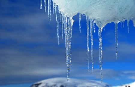 frozen ice in antarctica, blue skyの写真素材