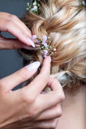 wedding hairstyle bride flowers stylist hair artist