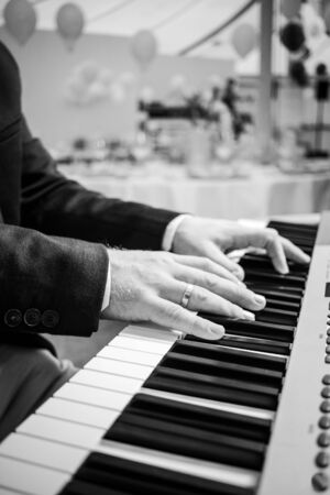 piano player finger keys pianist artist keyboard music teacherの写真素材
