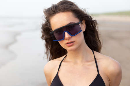 woman sunglass fashion accessories on beach modern model girlの写真素材