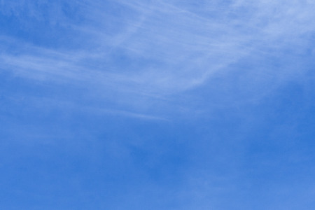 Blue Sky with very few Cloudsの写真素材