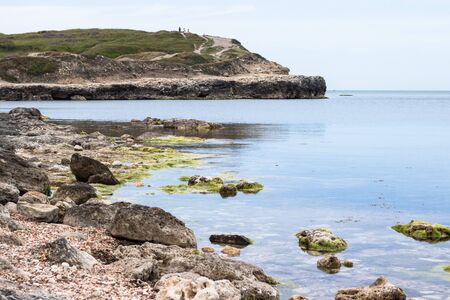 Rocks, sea and sky background