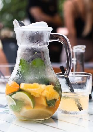 Lemonade pitcher with lemon, orange and mint. Summer drinkの写真素材