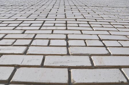 Brick wall, stretching beyond the horizon  