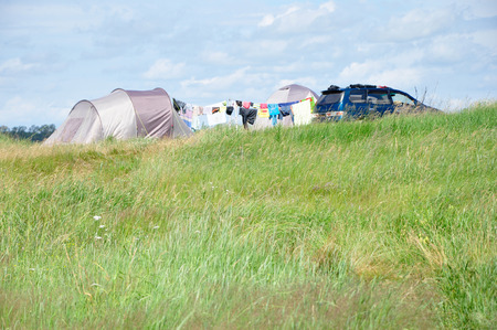 Camping on a green meadow.の写真素材