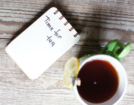 cup of tea and noteの写真素材