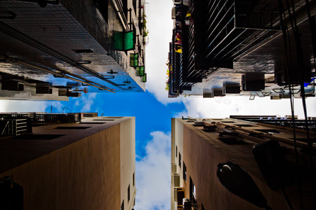 cross-shaped skylight through the roofs, loneliness in the cityの写真素材