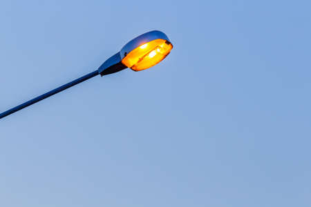 Electric Street lamp at dawnの写真素材