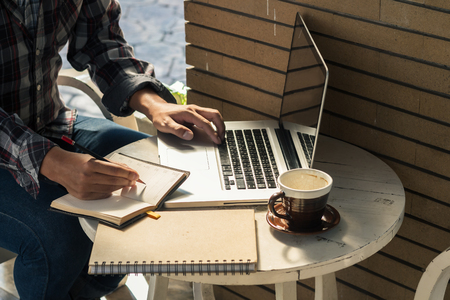 businessman working with laptop coffee on backgroundの写真素材