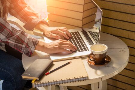 businessman working with laptop coffee on backgroundの写真素材