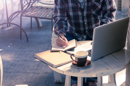 businessman working with laptop coffee on backgroundの写真素材