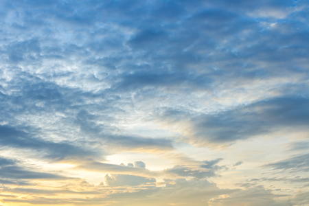 beautiful fluffy clouds in Blue sky background.の写真素材