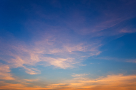 blue sky background with white clouds sunset.の写真素材
