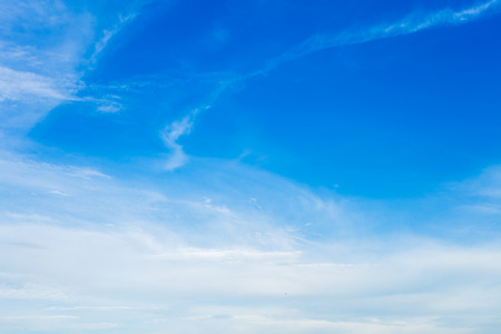 blue sky background texture with white clouds.の写真素材