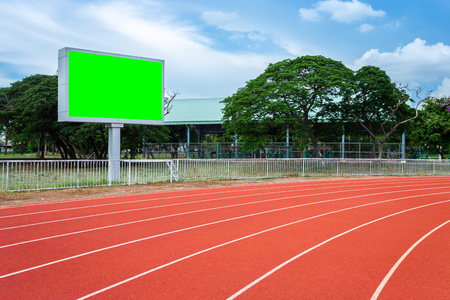 Digital blank scoreboard at football stadium with running track in sport stadium in outdoor ,Advertising Billboard LED, Empty green screen digital.の写真素材
