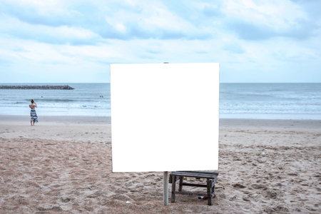 White blank billboard ready for new advertisement at view on sea coast,Tropical beach.の写真素材