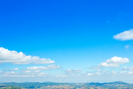 blue sky background texture with white clouds.の写真素材