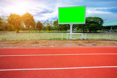 Digital blank scoreboard at football stadium with running track in sport stadium in outdoor ,Advertising Billboard LED, Empty green screen digital.の写真素材