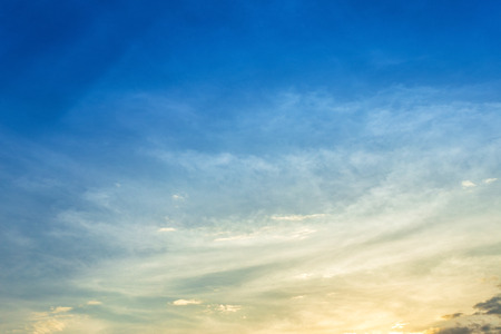 blue sky background texture with white clouds sunset.の写真素材