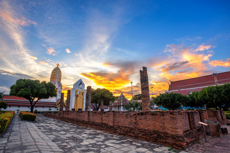 Buddha statue at sunset are Buddhist temple and major tourist attractions at Wat Phra Si Rattana Mahathat also colloquially referred to as Wat Yai is a Buddhist temple (wat) in Phitsanulok,Thailand.の写真素材