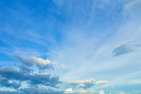 blue sky background texture with white clouds sunset.の写真素材