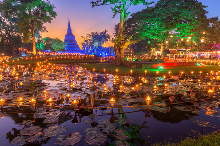 Sukhothai Co Lamplighter Loy Kratong Festival at The Sukhothai Historical Park covers the ruins of Sukhothai, in what is now Northern Thailand.の写真素材