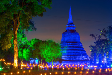 Sukhothai Co Lamplighter Loy Kratong Festival at The Sukhothai Historical Park covers the ruins of Sukhothai, in what is now Northern Thailand.の写真素材