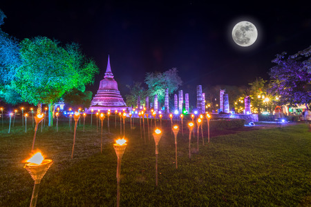 Sukhothai Co Lamplighter Loy Kratong Festival at The Sukhothai Historical Park covers the ruins of Sukhothai, in what is now Northern Thailand. With full moonの写真素材
