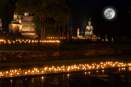 Sukhothai Co Lamplighter Loy Kratong Festival at The Sukhothai Historical Park covers the ruins of Sukhothai, in what is now Northern Thailand. With full moonの写真素材