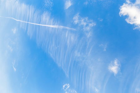 Blue sky background texture with white clouds.の写真素材