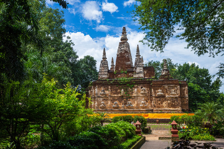 Wat Chet Yot, seven pagoda temple It is a major tourist attraction in Chiang Mai, Thailand.with evening,Temple in Chiang Maiの写真素材