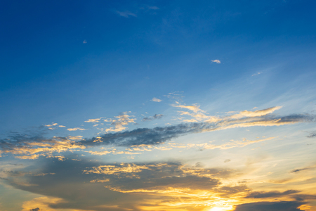 blue sky background texture with white clouds sunsetの写真素材