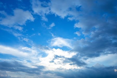 blue sky background texture with white cloudsの写真素材