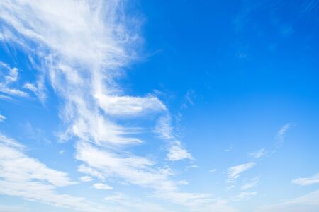 blue sky background texture with white clouds.の写真素材