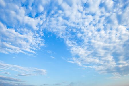 blue sky background texture with white clouds.の写真素材