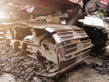 Close-up of Crawler tracks combine harvesters of The machine for harvesting from the fields.の写真素材