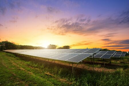 Solar panel on dramatic sunset sky background, Alternative energy conceptの写真素材